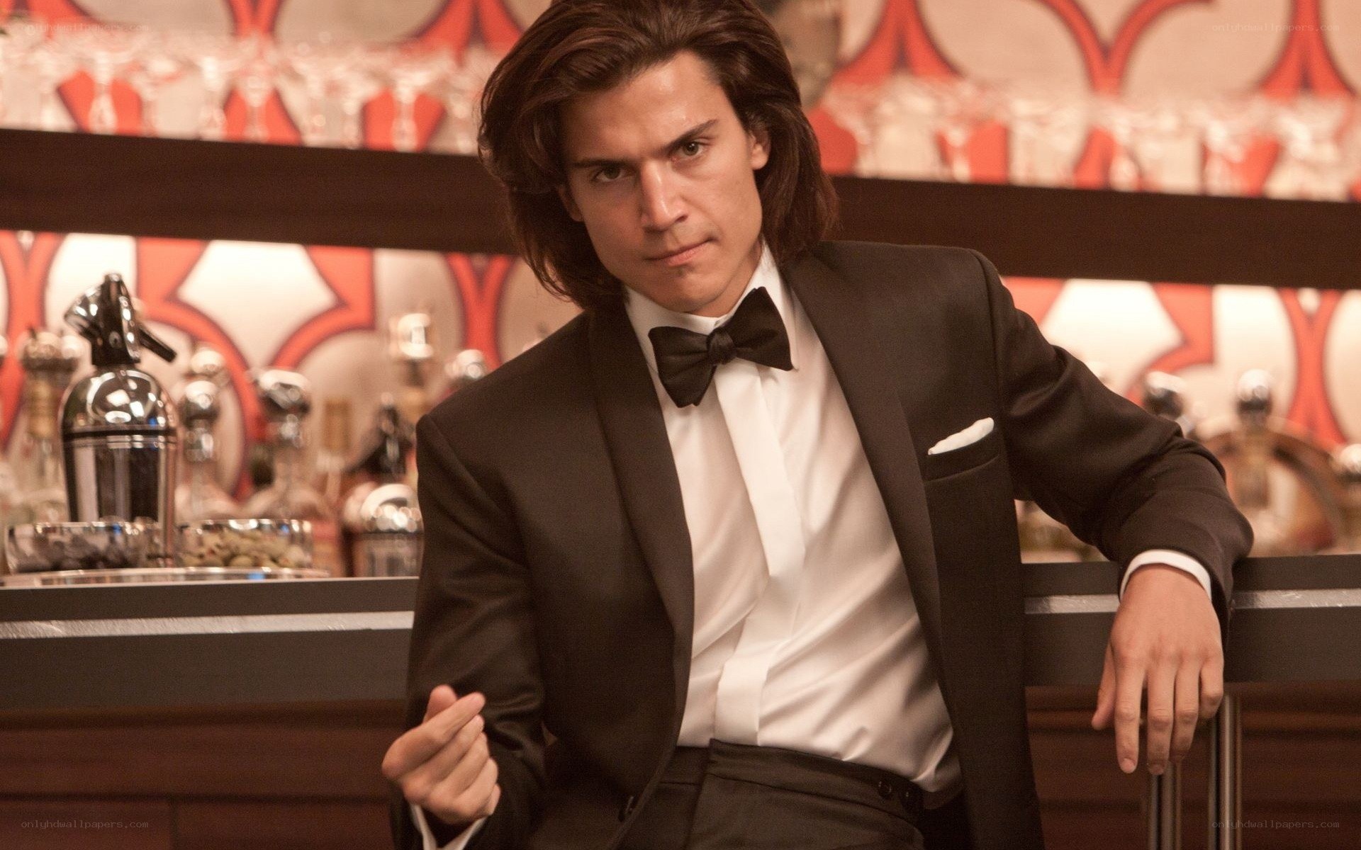 Man in tuxedo at bar