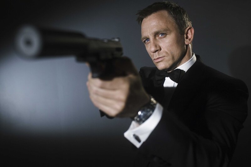 Man in Tuxedo Holding Gun — Black, Dramatic, Photograph
