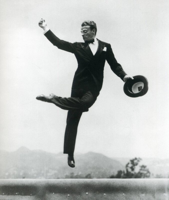Man in tuxedo jumping