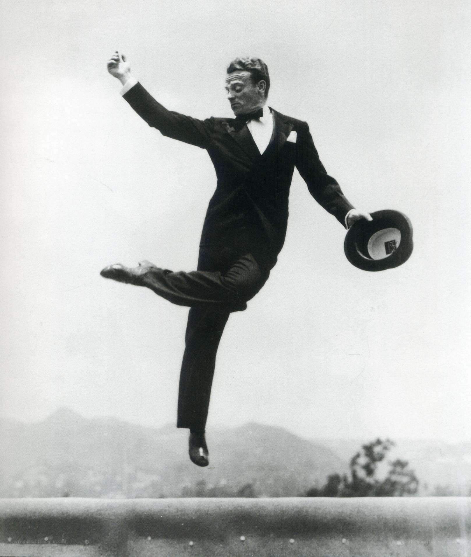 Man in tuxedo jumping