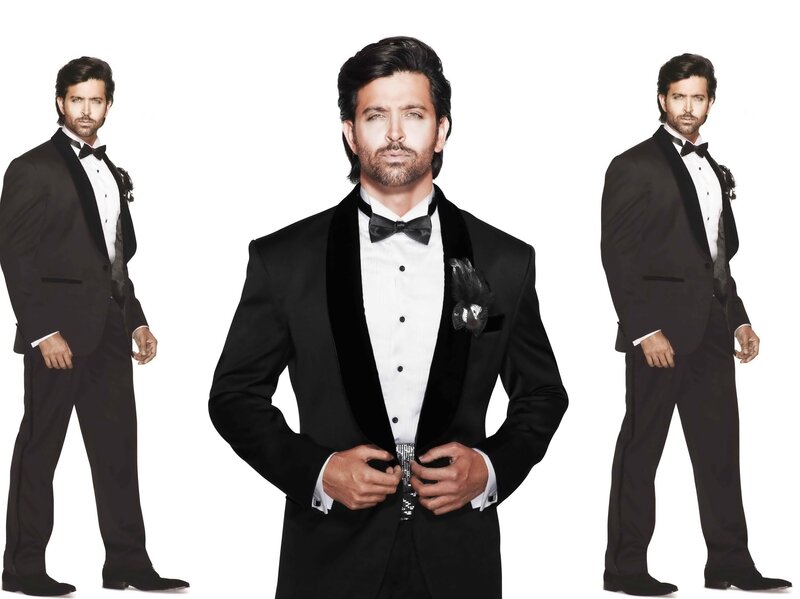 Man in tuxedo poses