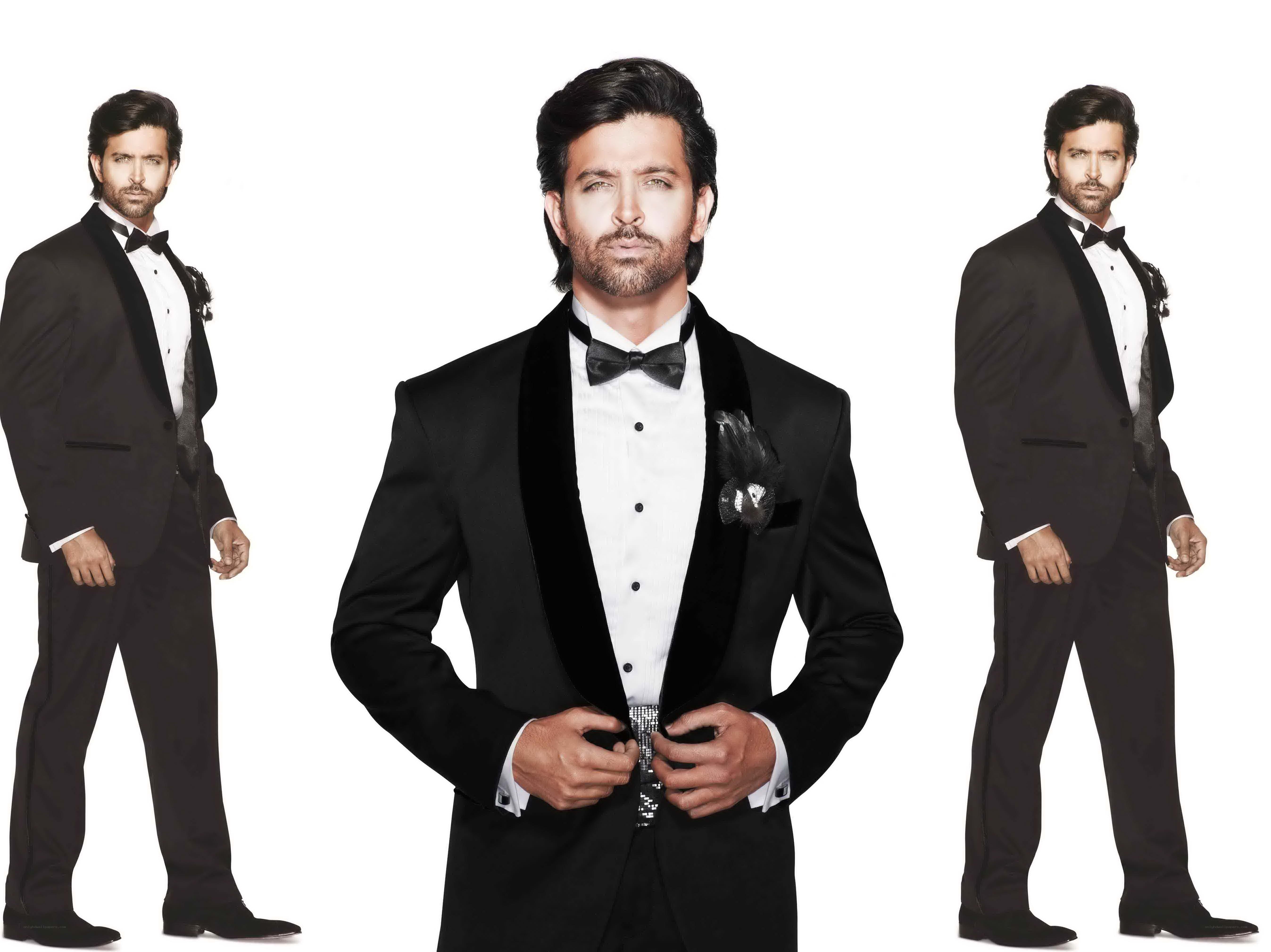 Man in tuxedo poses