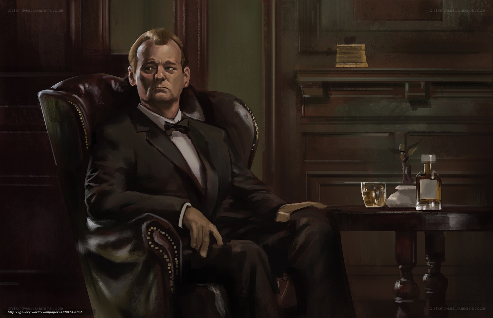 man in tuxedo sitting in chair
