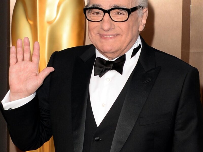 Man in Tuxedo Waving
