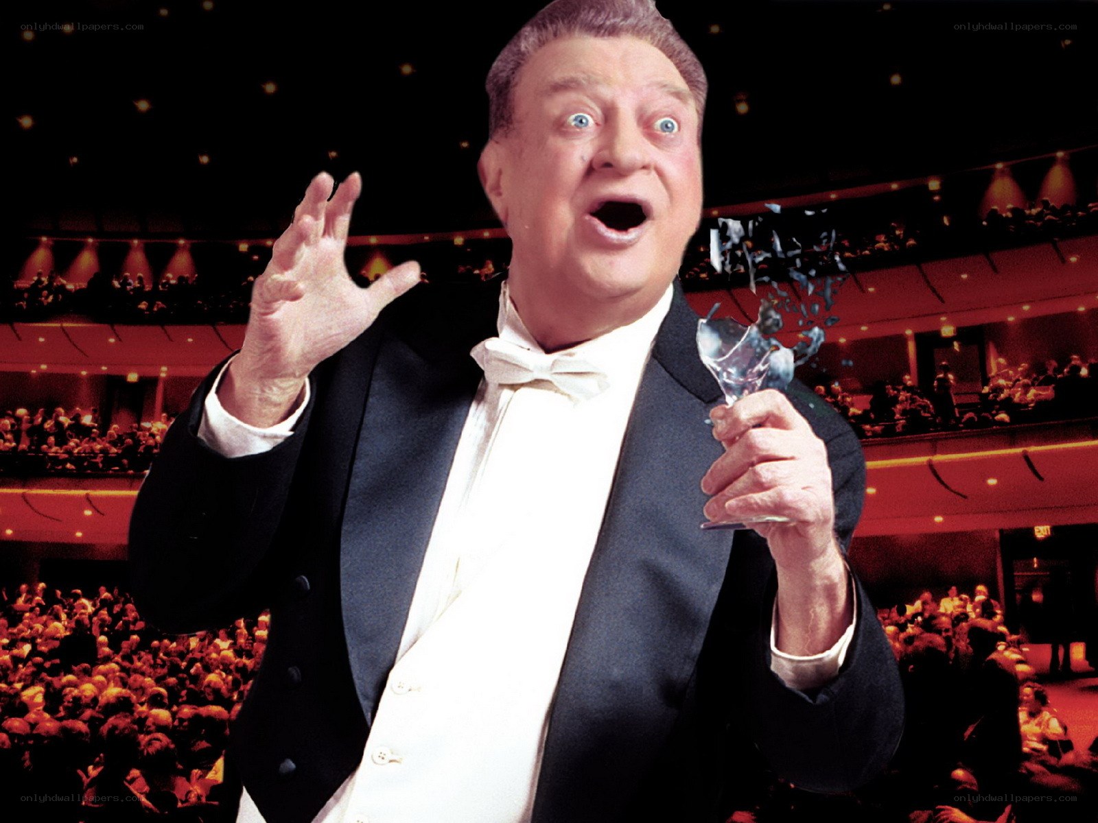 Man in tuxedo with broken glass