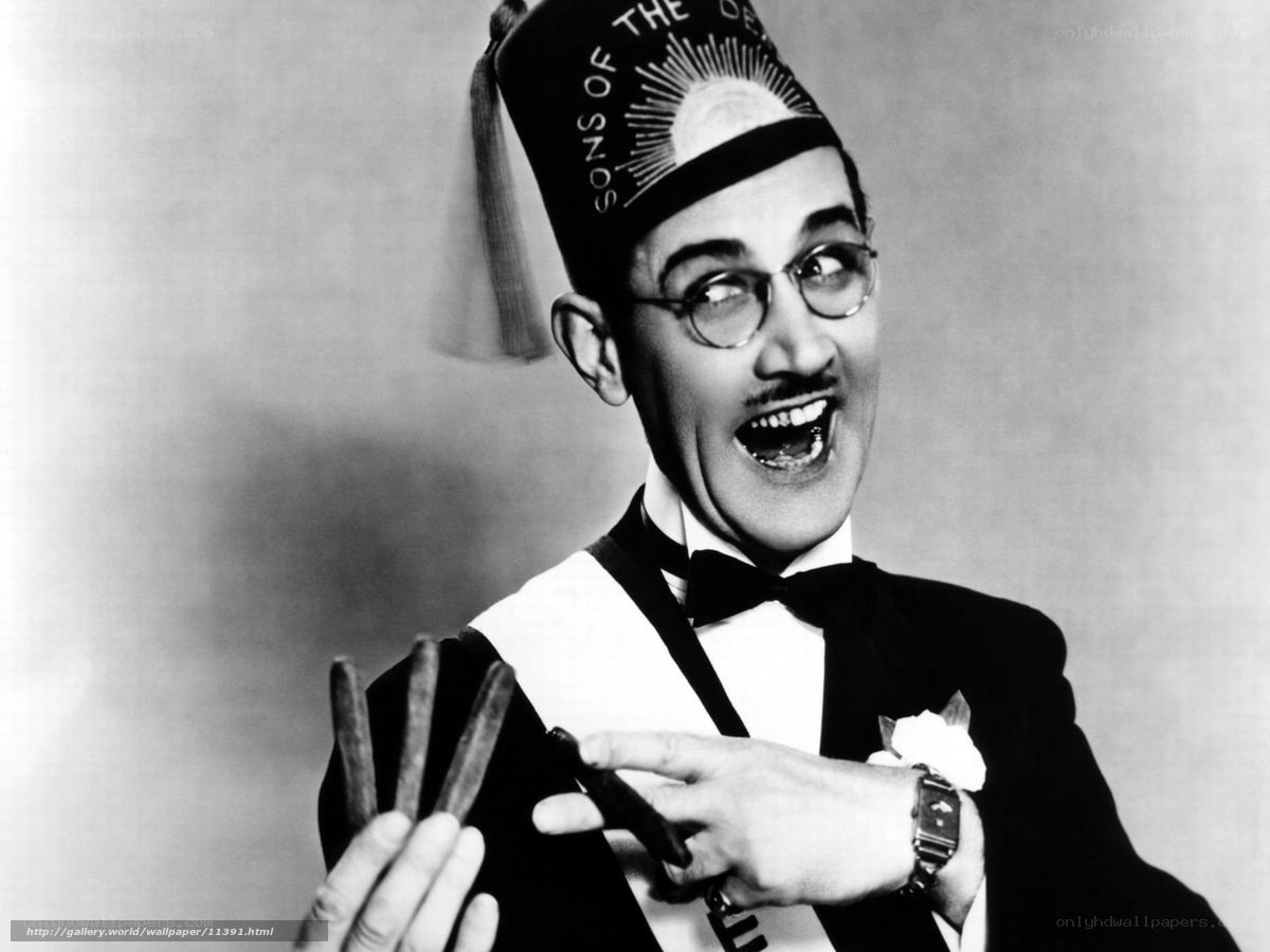 Man in tuxedo with fez