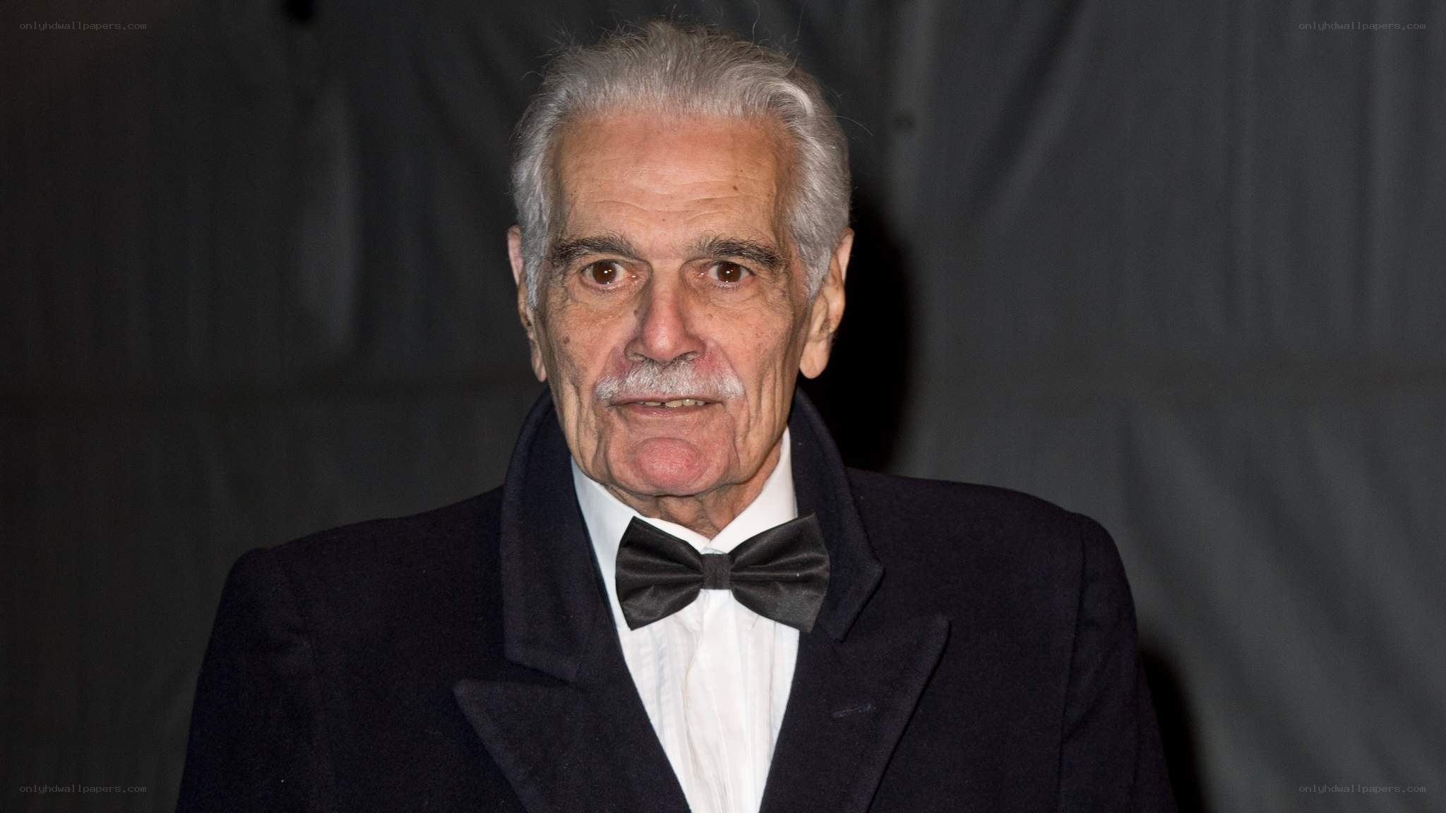 Man in tuxedo with mustache