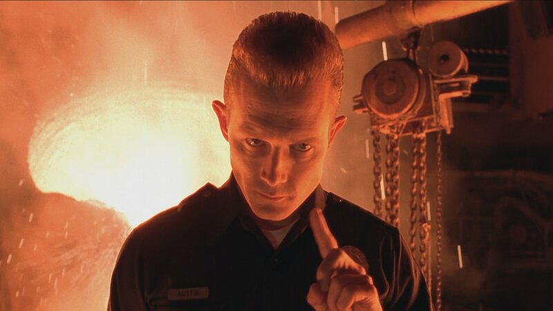 Man in Uniform Pointing