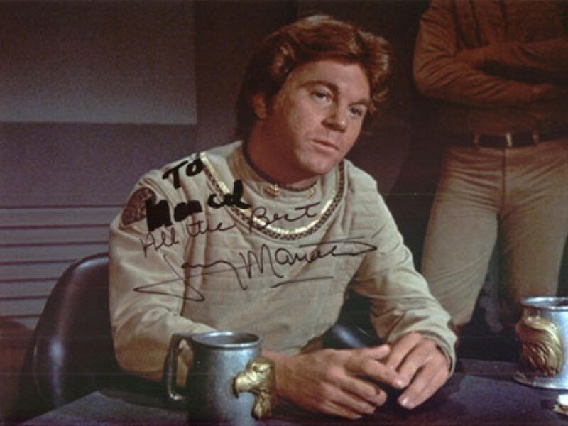 Man in Uniform Sitting
