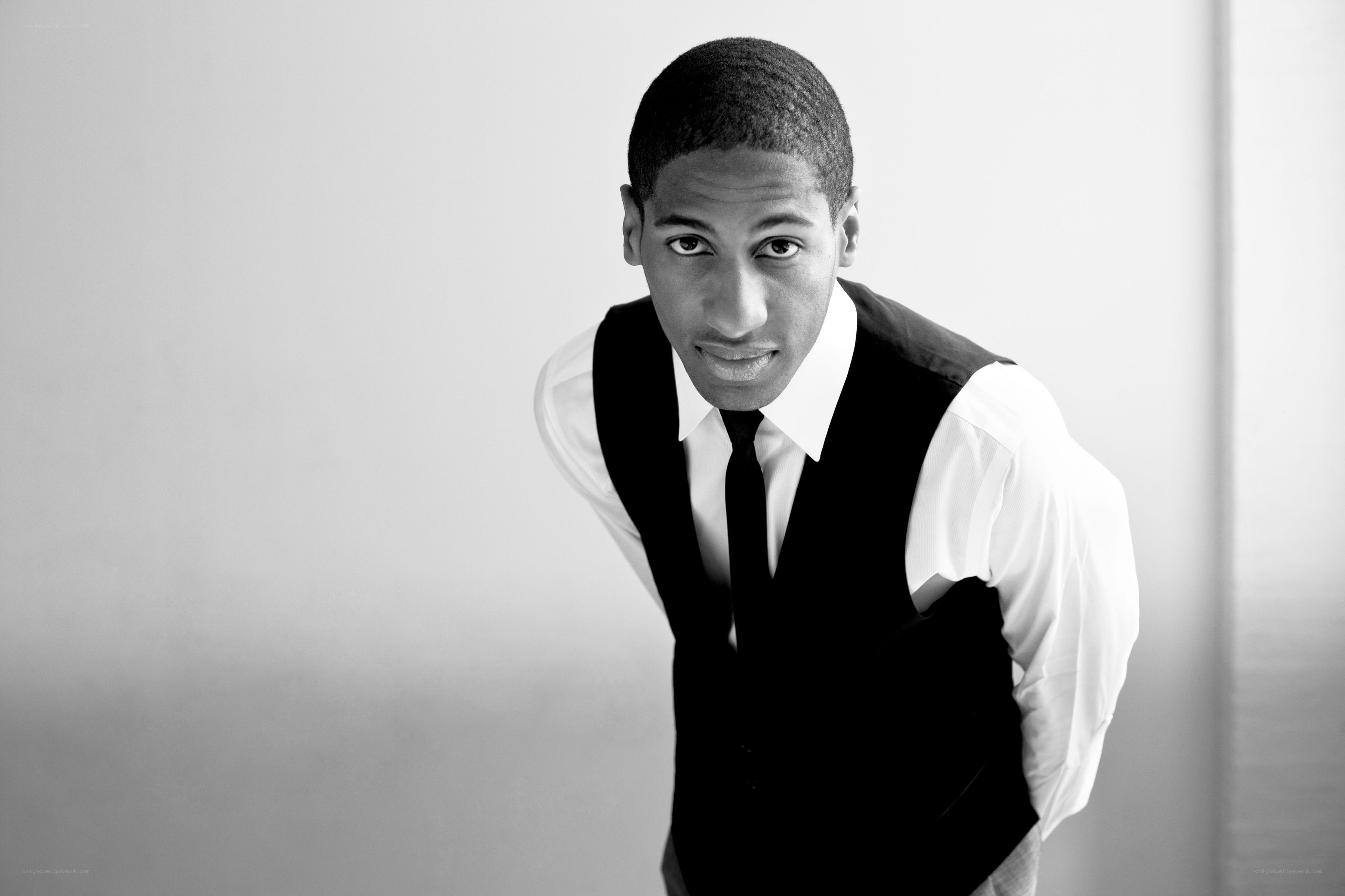 man in vest looking at camera