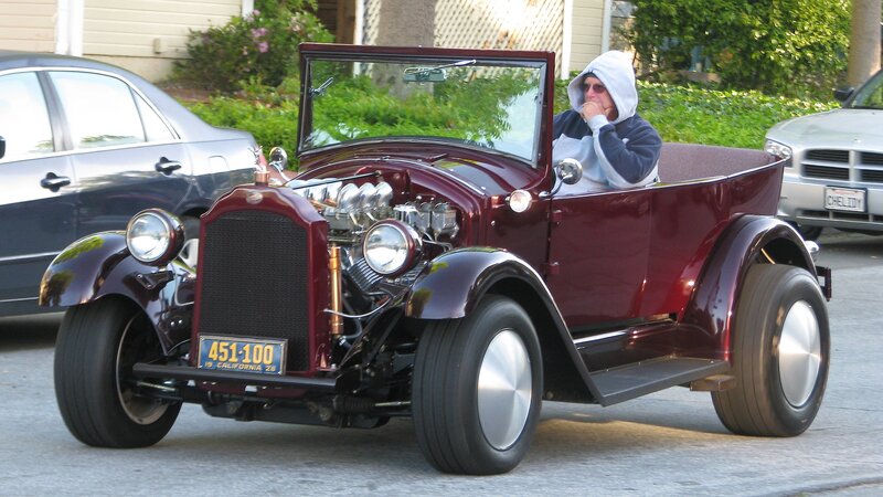Man in Vintage Car — Maroon