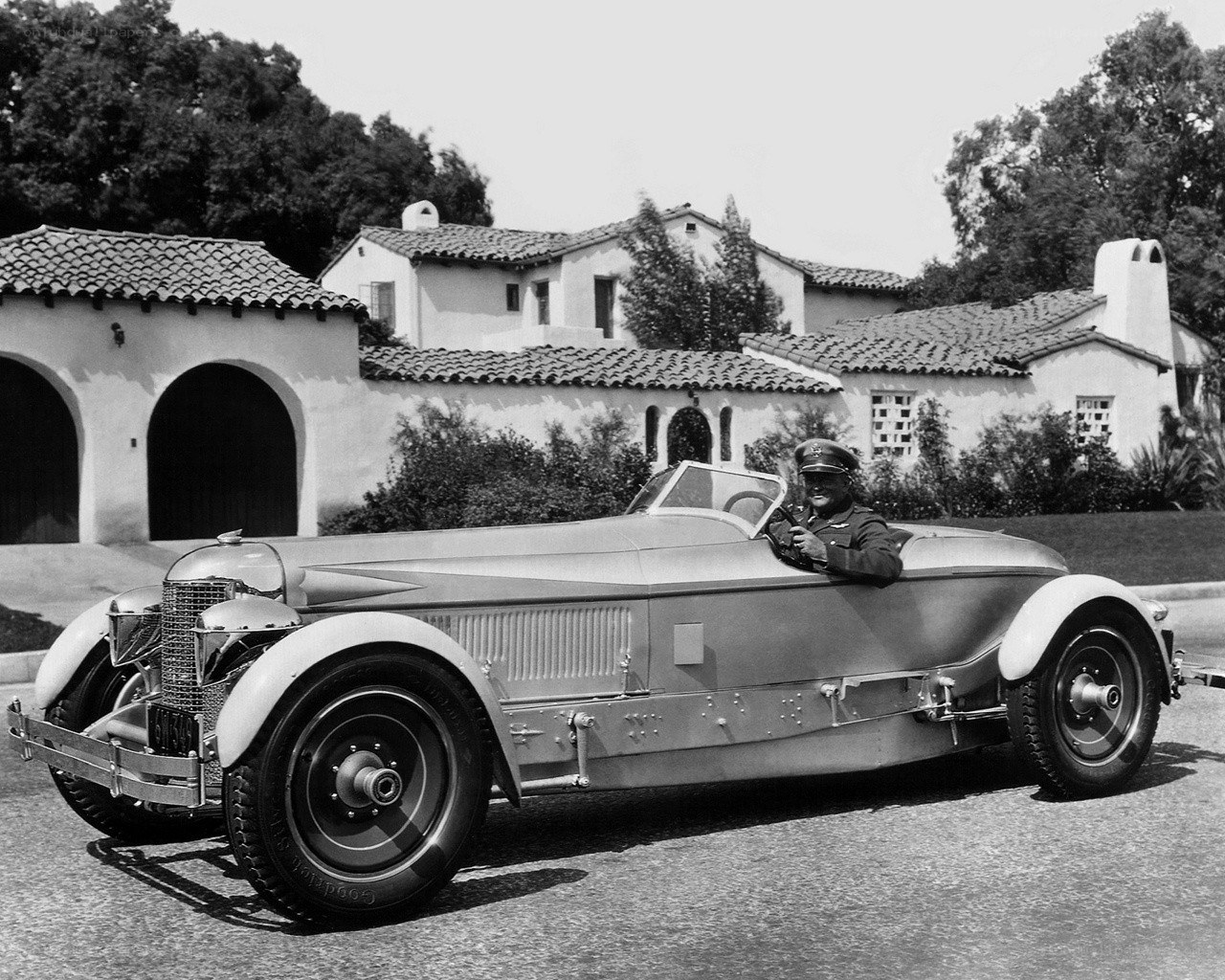 Man in vintage car