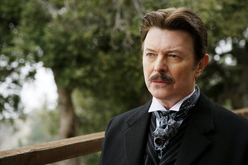 man in vintage suit with mustache