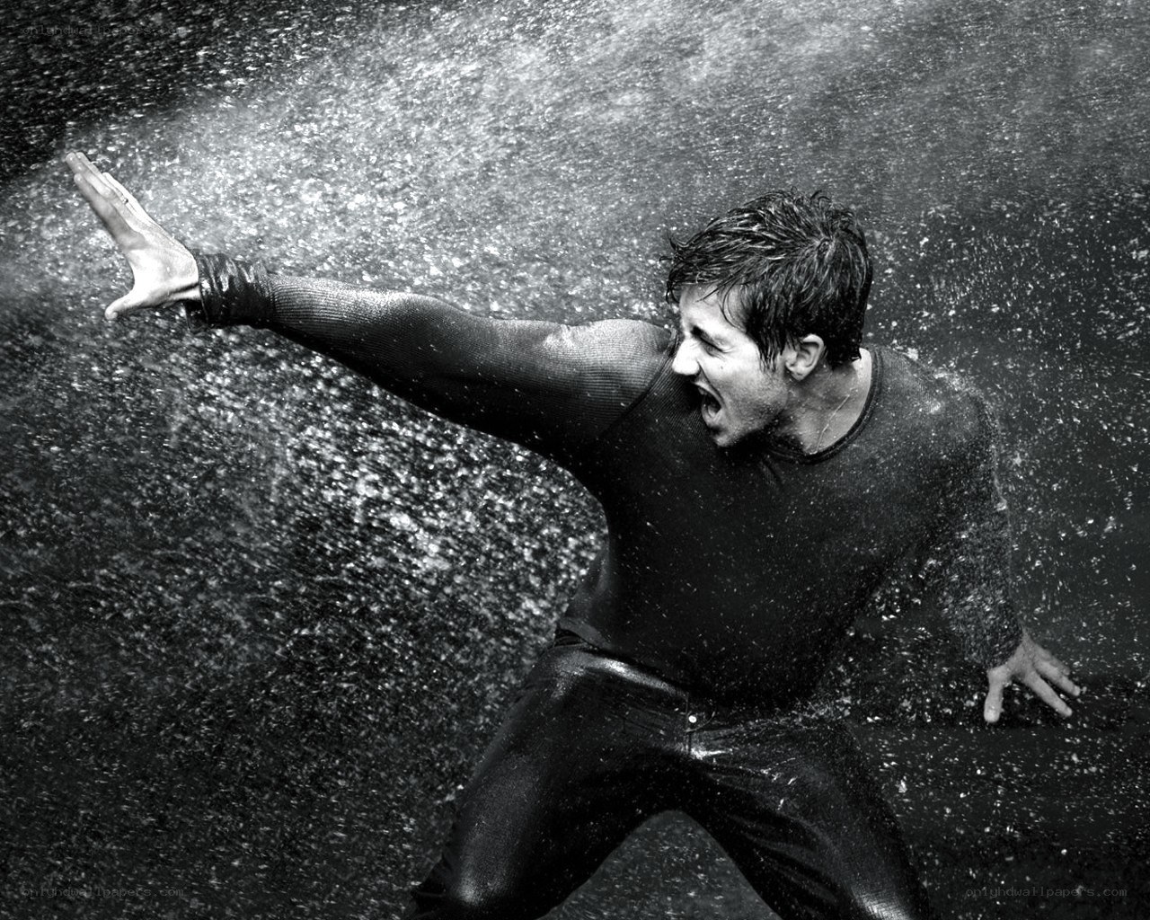 man in water spray