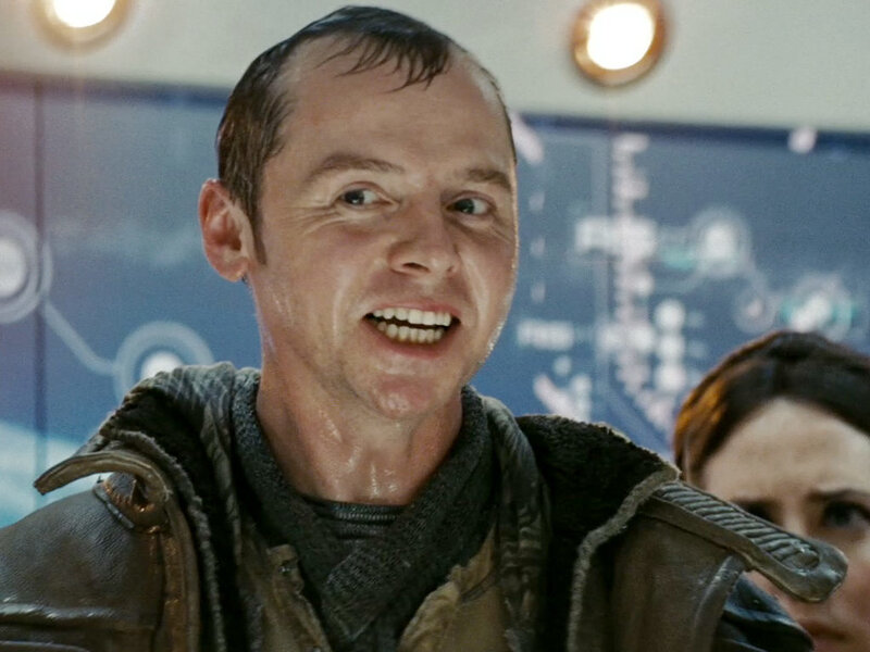 man in wet clothing smiling