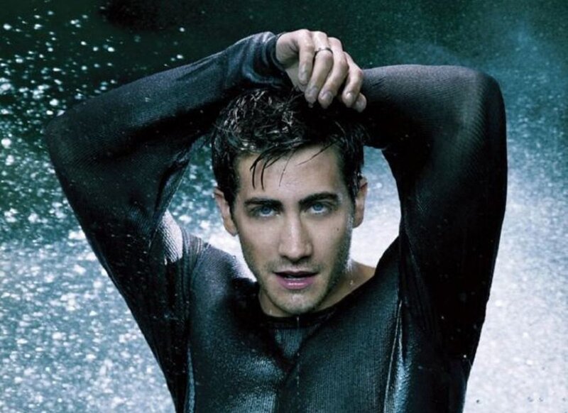 man in wet suit under water