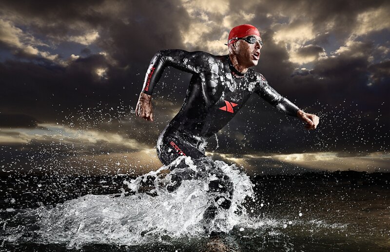 Man in Wetsuit Swimming