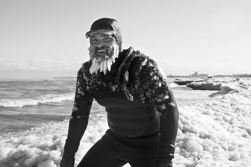 Man in Wetsuit with Ice