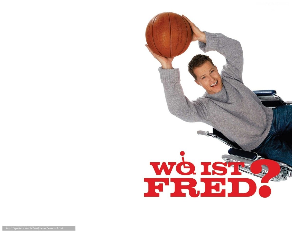 Man in wheelchair with basketball