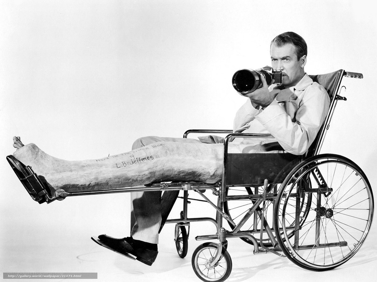 man in wheelchair with camera