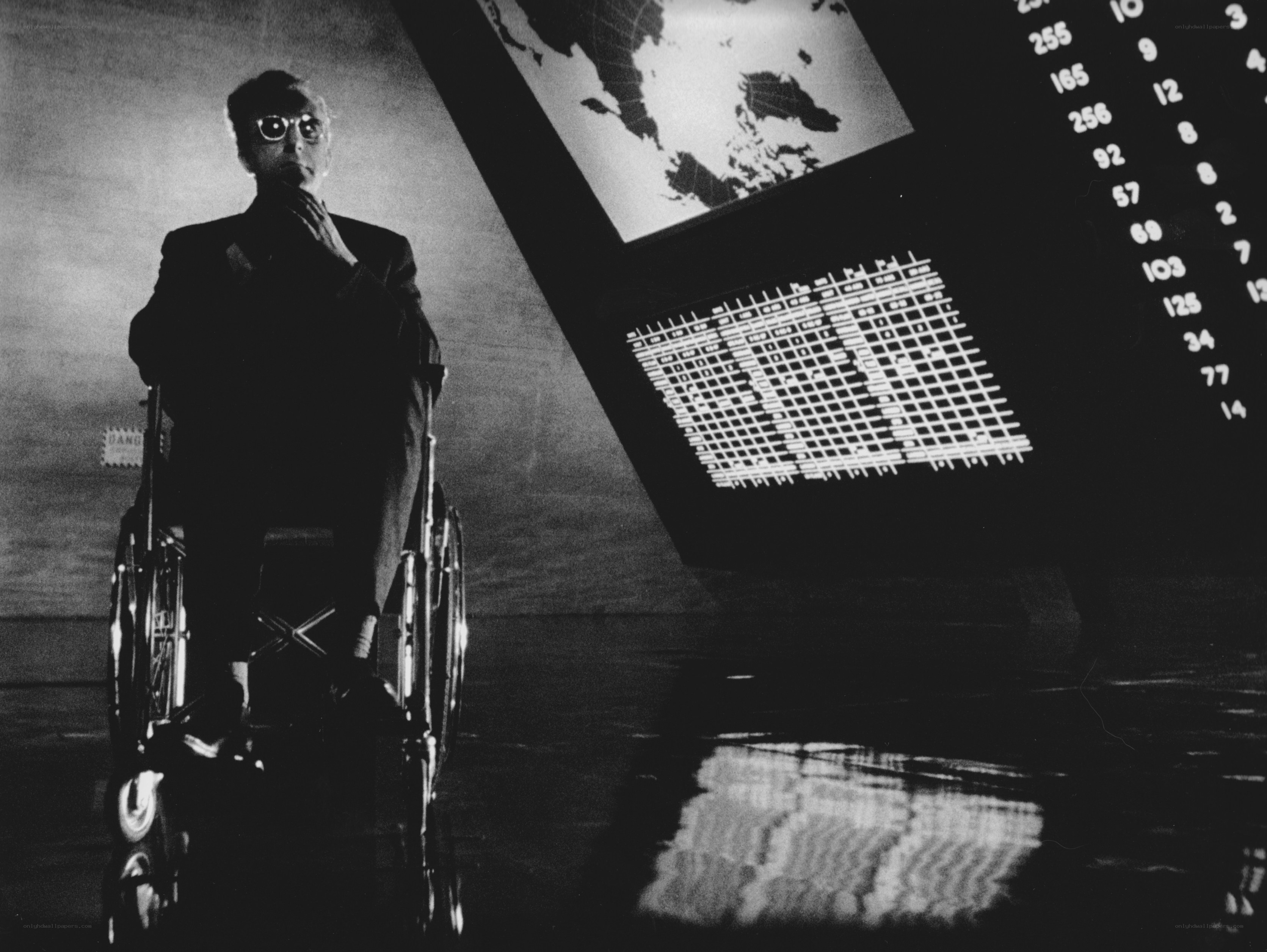 Man in wheelchair with data screens