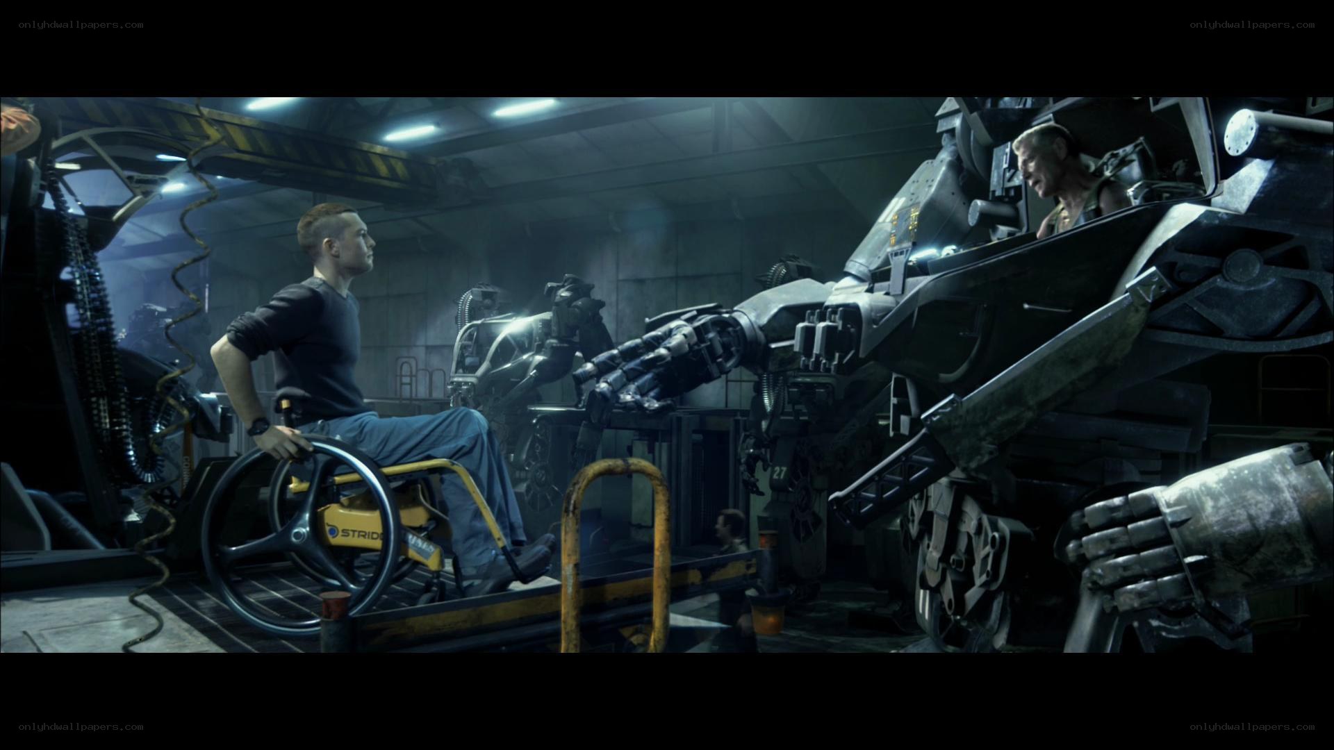 Man in wheelchair with robot