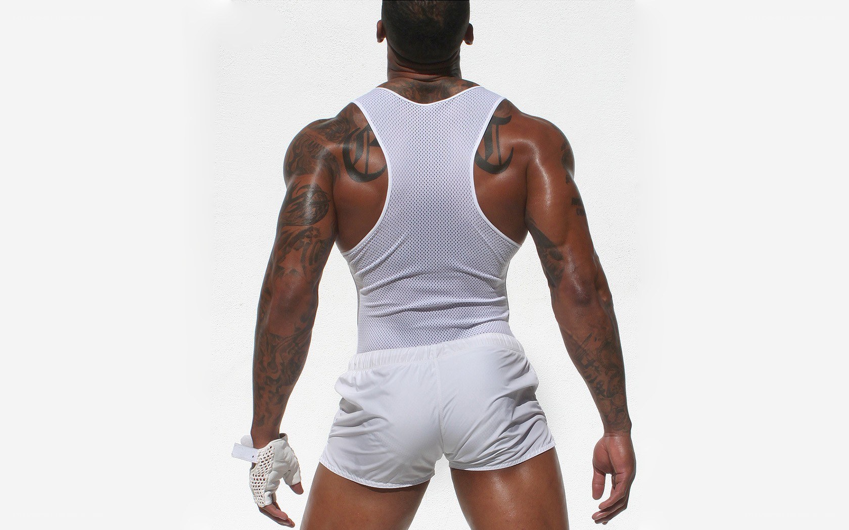 man in white athletic wear