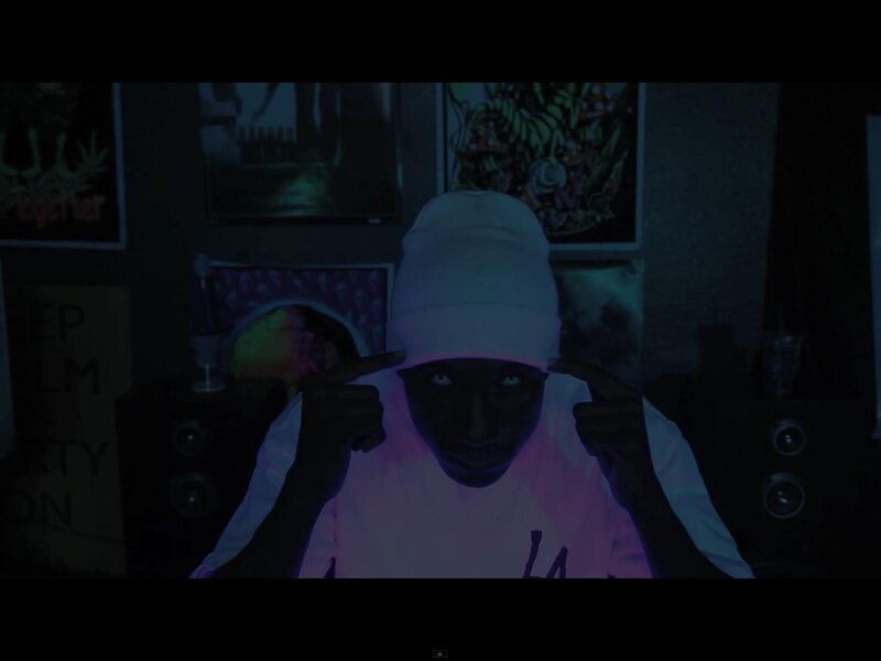 Man in White Beanie
