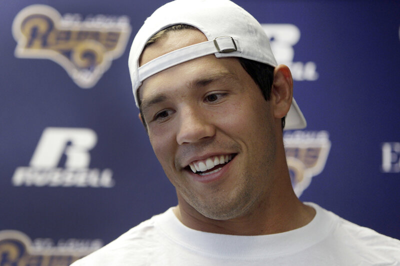 man in white cap smiling