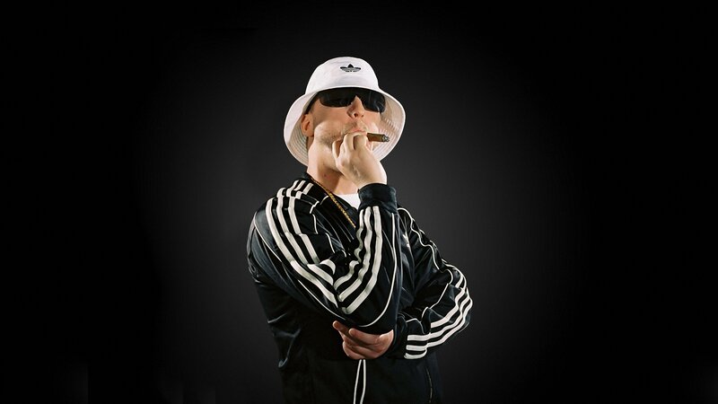 man in white hat smoking cigar