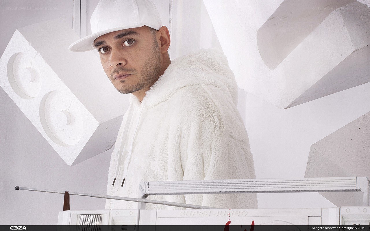 Man in white hoodie and cap