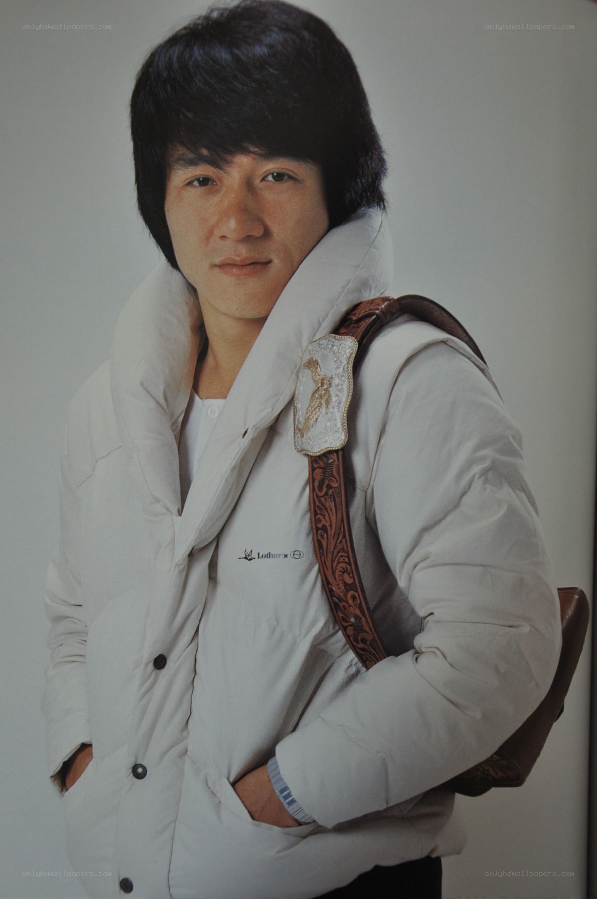 man in white jacket with bag