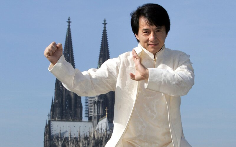 Man in White Martial Arts Pose — Confident