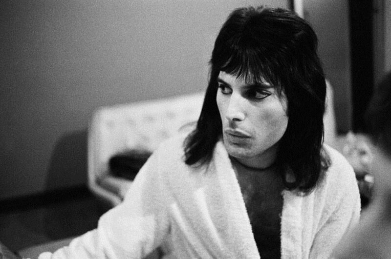 Man in White Robe — Black, Serious