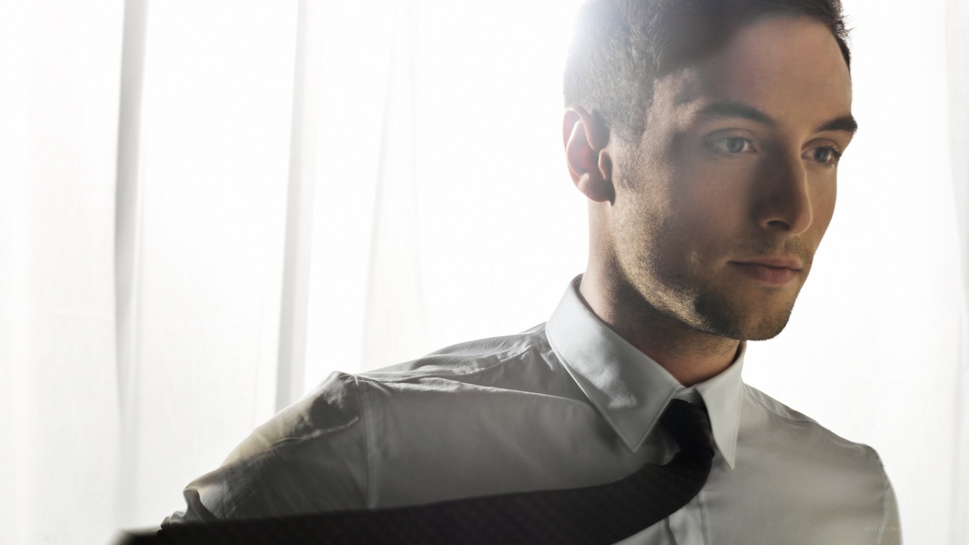 man in white shirt and tie