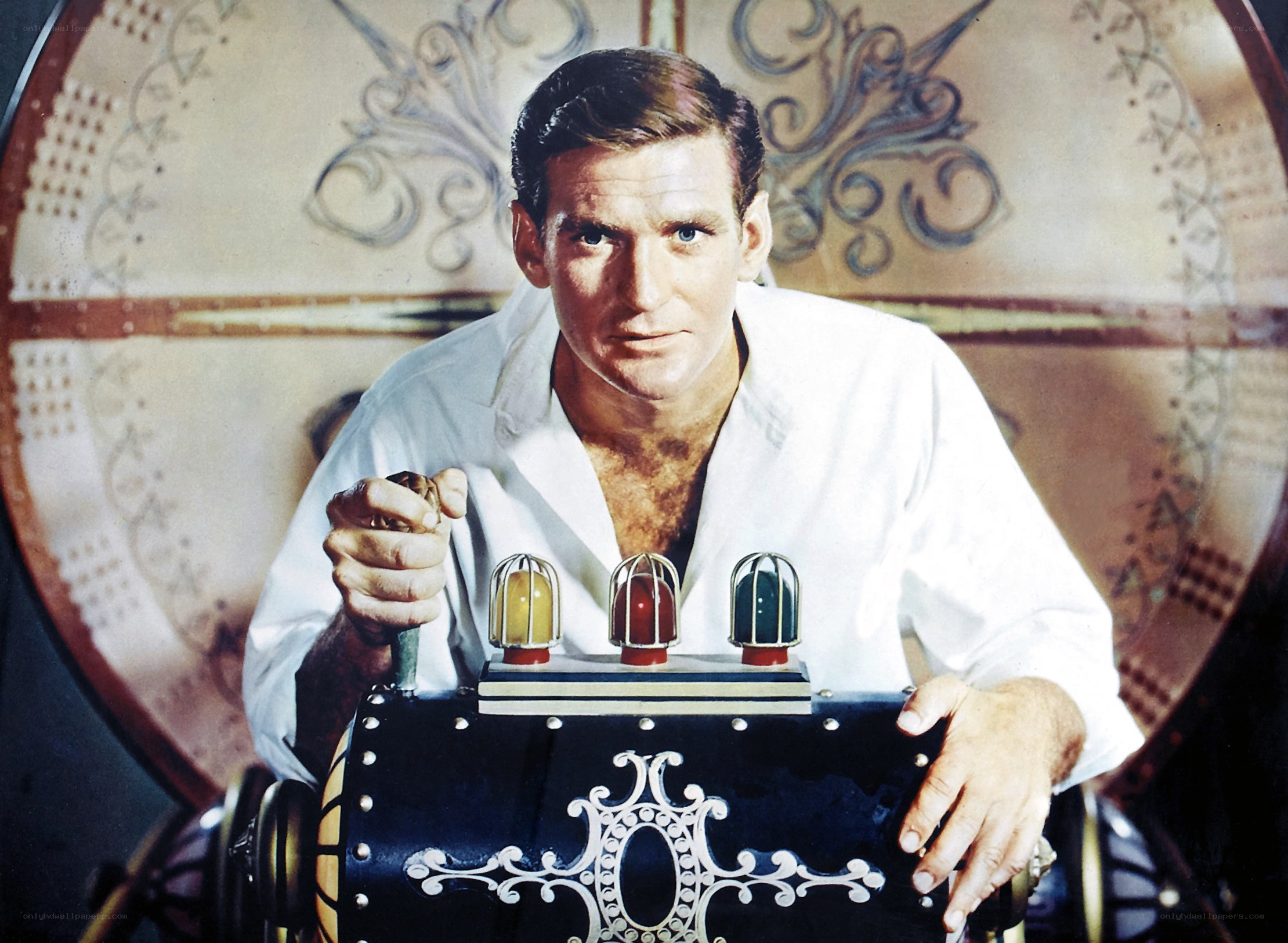 Man in white shirt at control panel