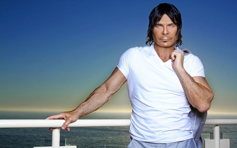 man in white shirt by the sea