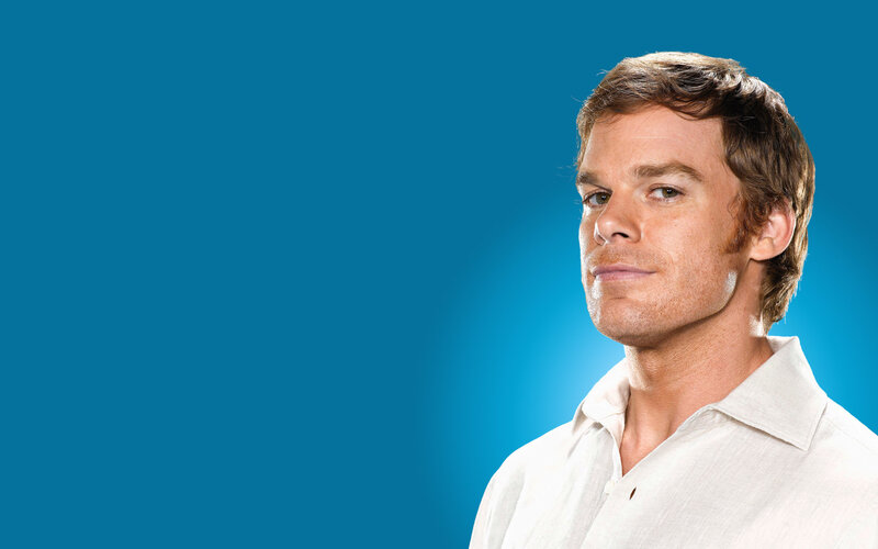 man in white shirt on blue