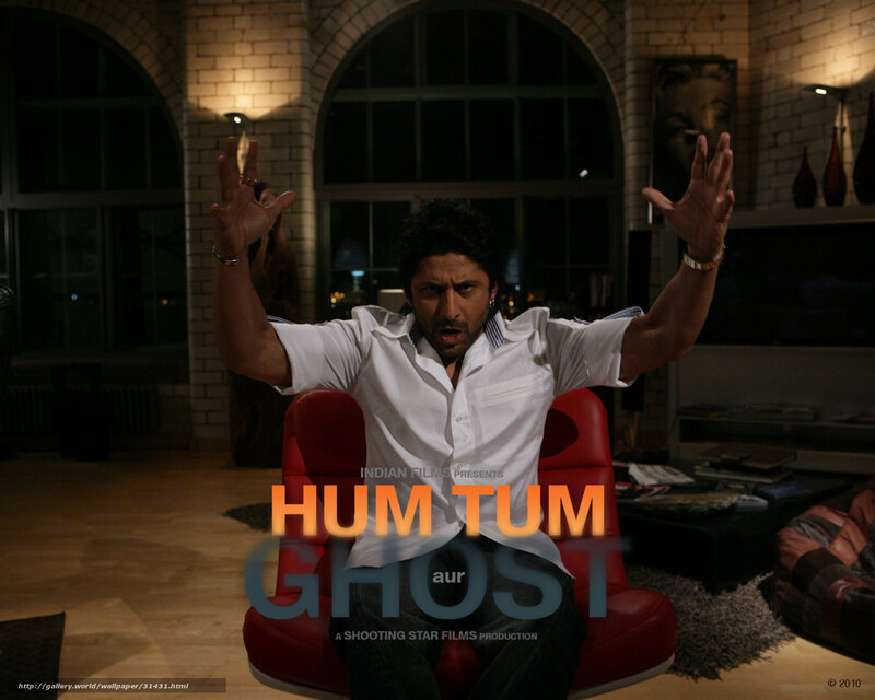 Man in white shirt on red chair