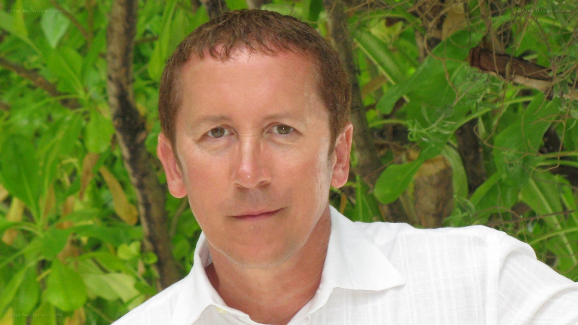 man in white shirt outdoors