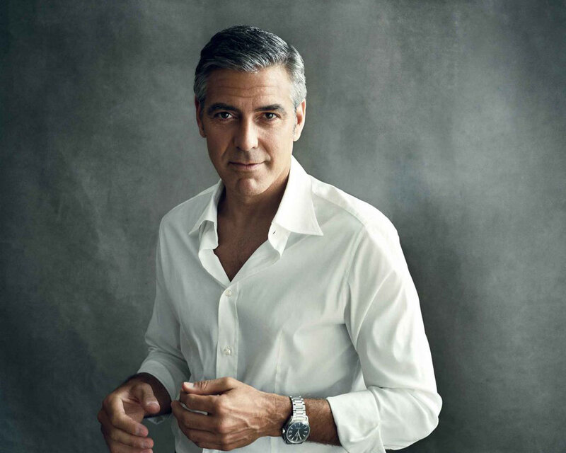Man in White Shirt — Serious