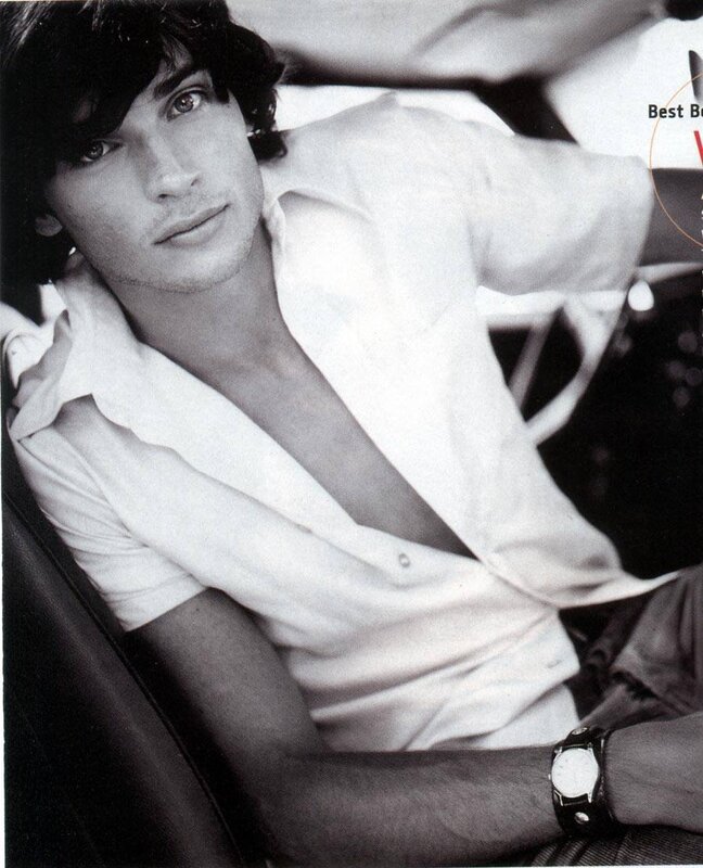 man in white shirt sitting
