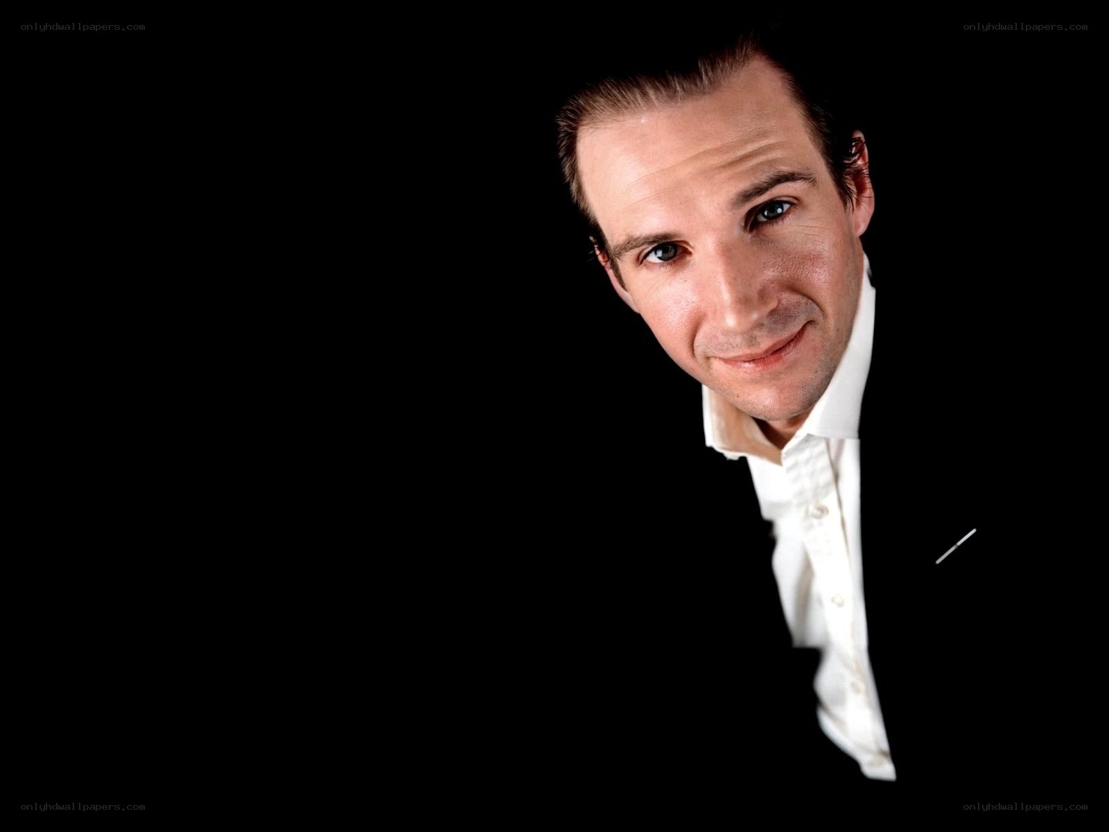 man in white shirt smiling