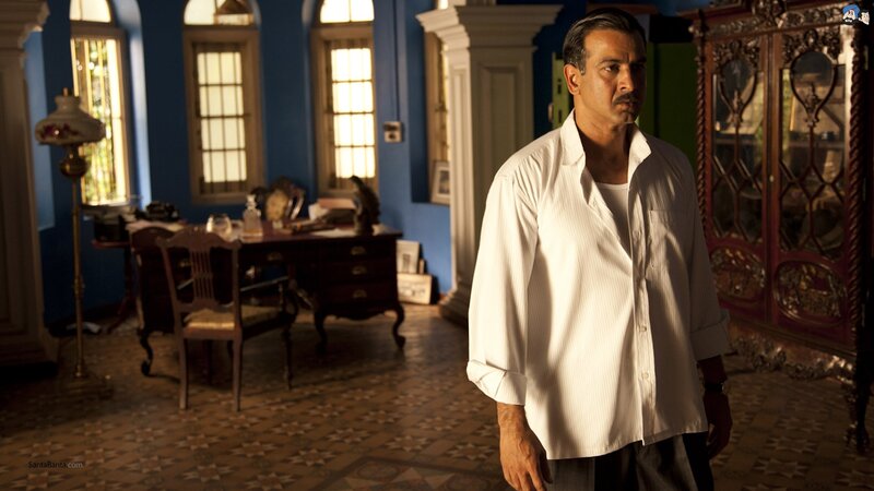 man in white shirt standing