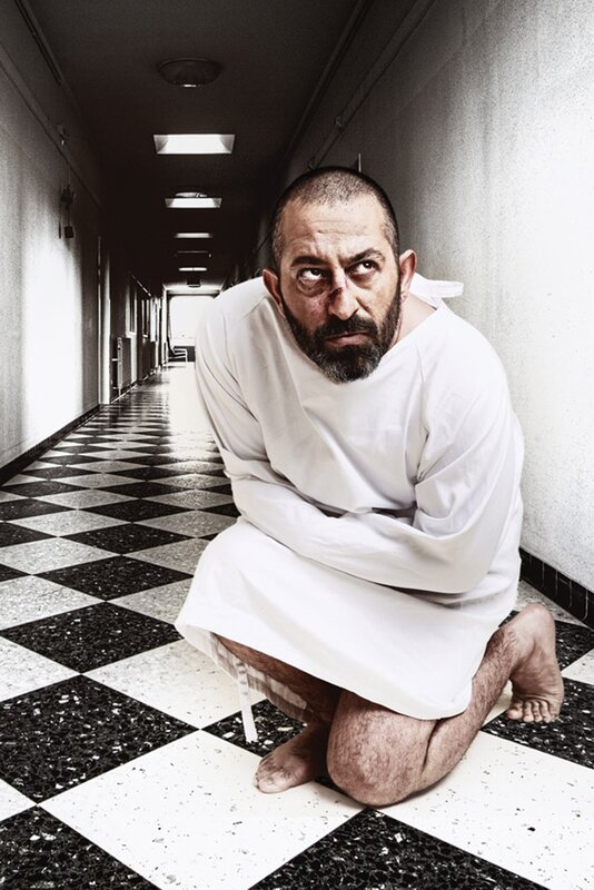 Man in white straitjacket
