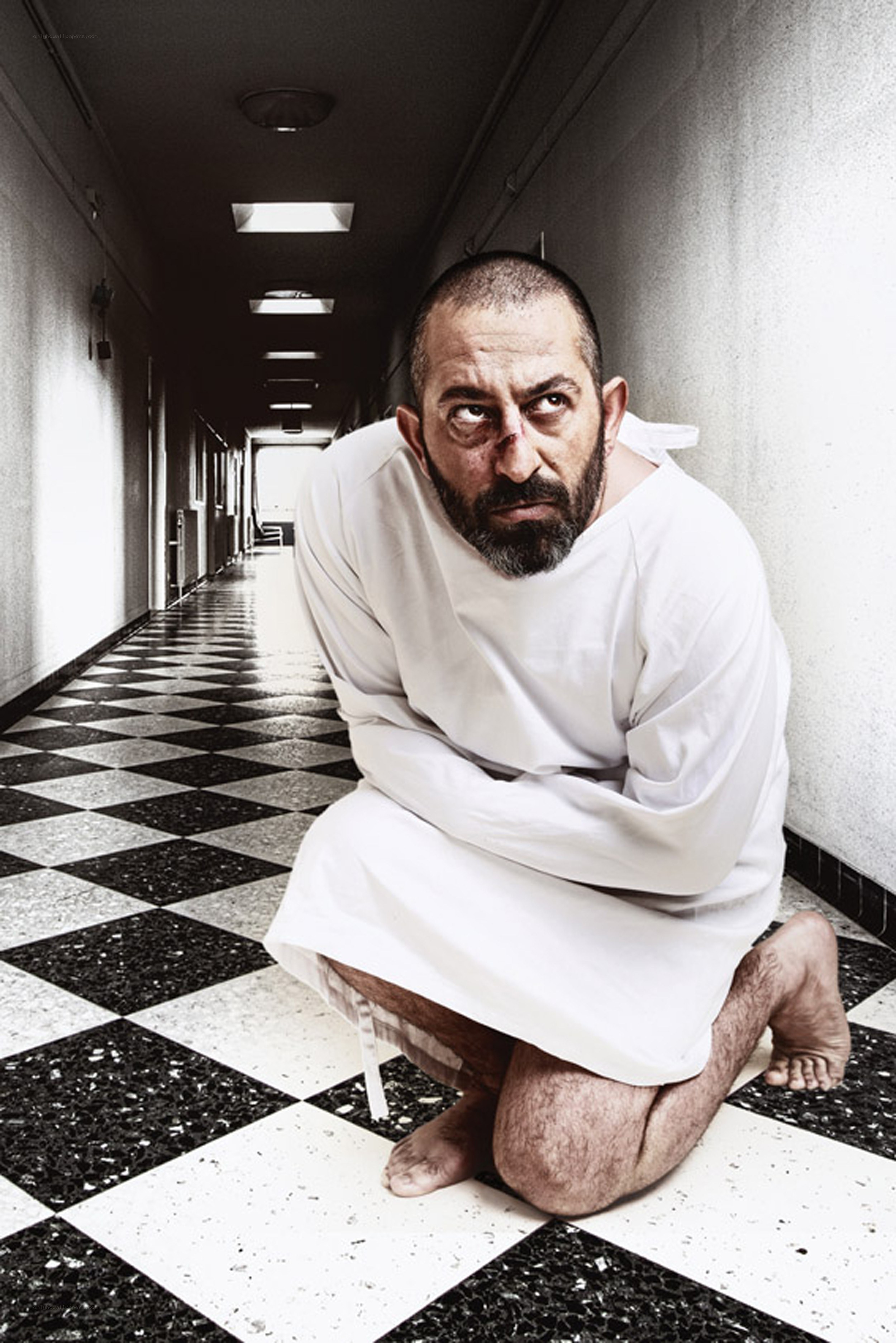 Man in white straitjacket