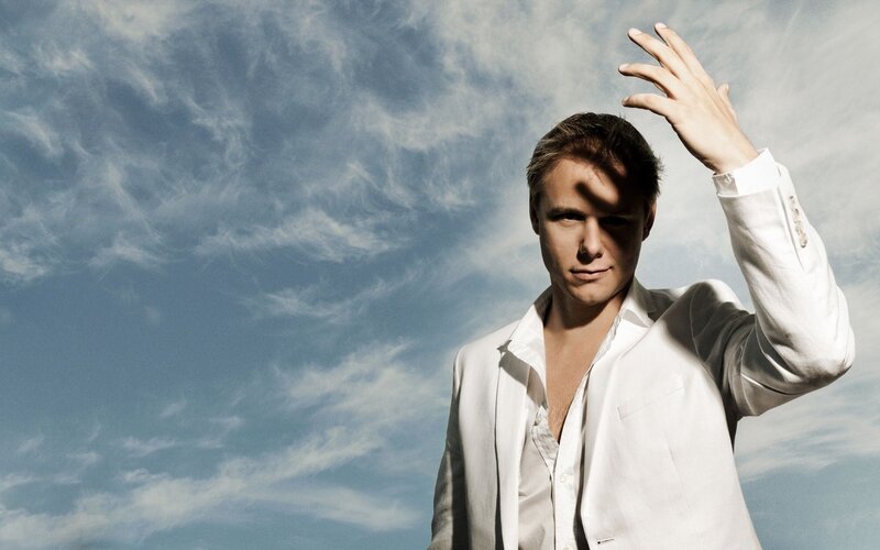man in white suit against sky