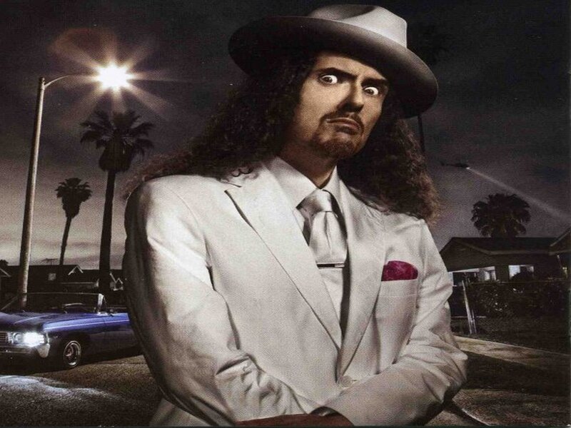 man in white suit at night