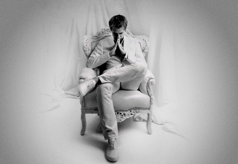Man in White Suit — Black, Contemplative