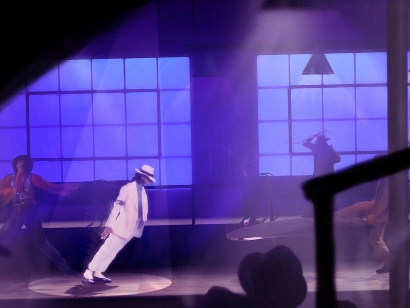 Man in White Suit Dancing